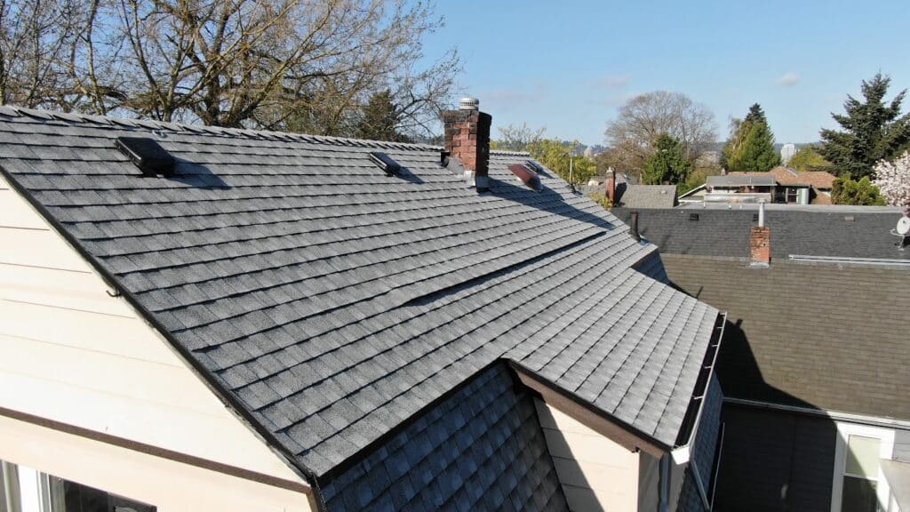 Kutsch Roofing team working on hail-damaged roof