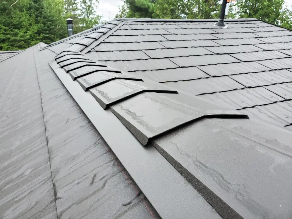 Kutsch Roofing team working on hail-damaged roof